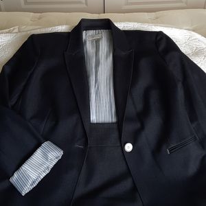 Navy 2 piece suit. Skirt and jacket